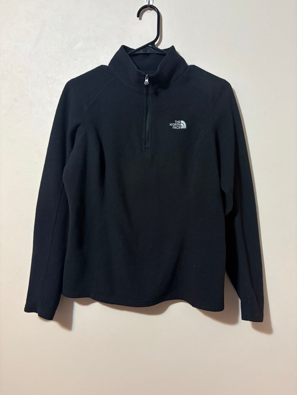 The North Face half zip woman’s pullover jacket size
Medium black